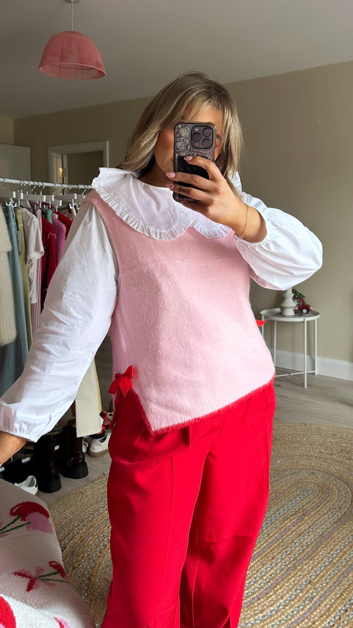 Sleeveless Knit Sweater with Red Bows